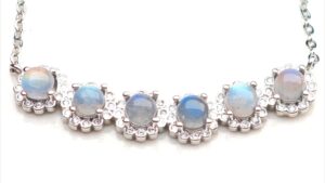 Moonchant Halo – Moonstone Glow & Silver Blossom Necklace